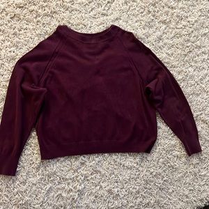 A new sweater size xl maroon.